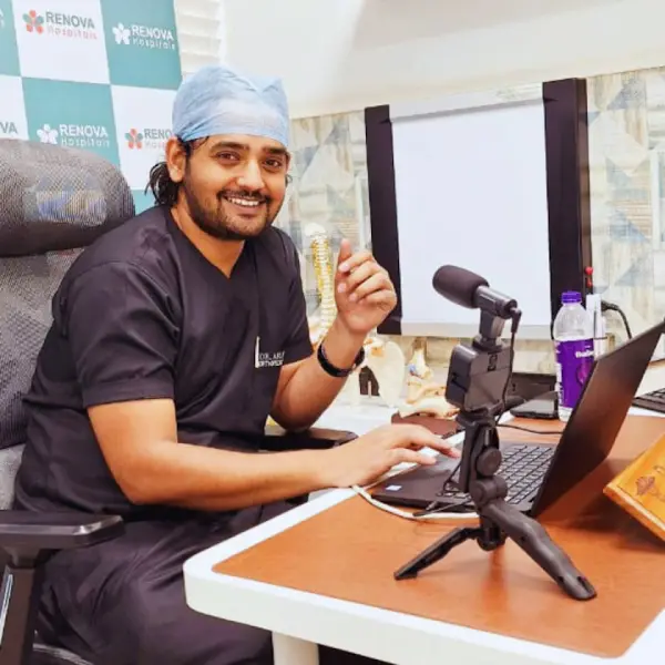 Dr Arun Dev