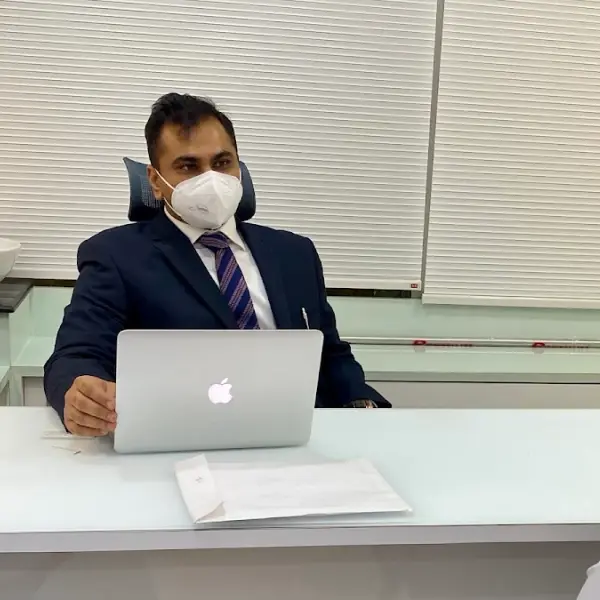 Dr Harshil Vora
