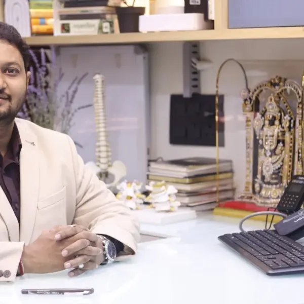 Dr Kalpesh Mande